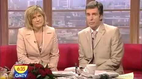 GMTV presenters Penny Smith and John Stapleton apologise to viewers over call-in competition irregularities. Screenshot: GMTV.