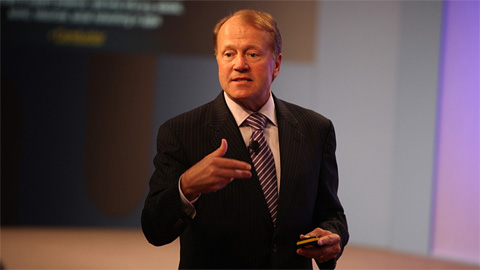 John Chambers, the chief executive of Cisco, announcing Videoscape at CES 2011. Photo: Cisco. All rights reserved.